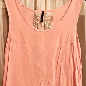 Lovely peach colored, lace back tank. Size large.